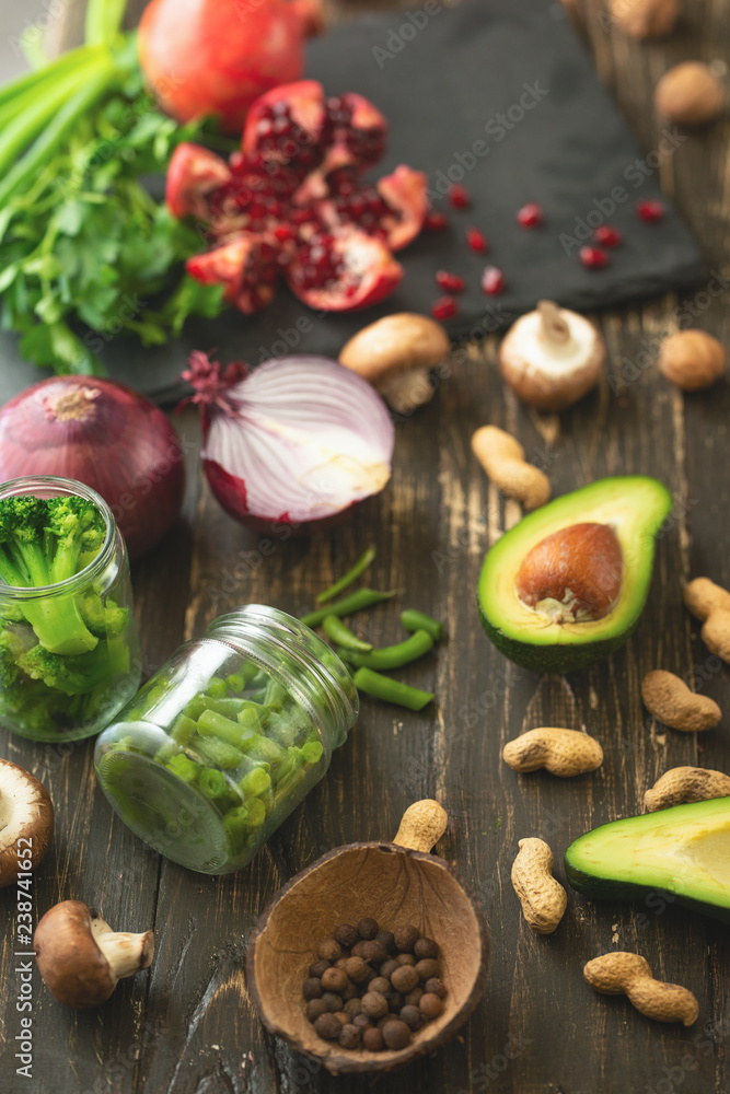 Winter vegetarian, vegan food cooking ingredients. Flat lay of vegetables, fruits, beans, kitchen utensils, olive oil on a wooden background, top view, Vertical Flat-lay. Clean and healthy food, detox Winter vegetarian, vegan food cooking ingredients. Flat lay of vegetables, fruits, beans, kitchen utensils, olive oil on a wooden background, top view, Vertical Flat-lay. Clean and healthy food, detox