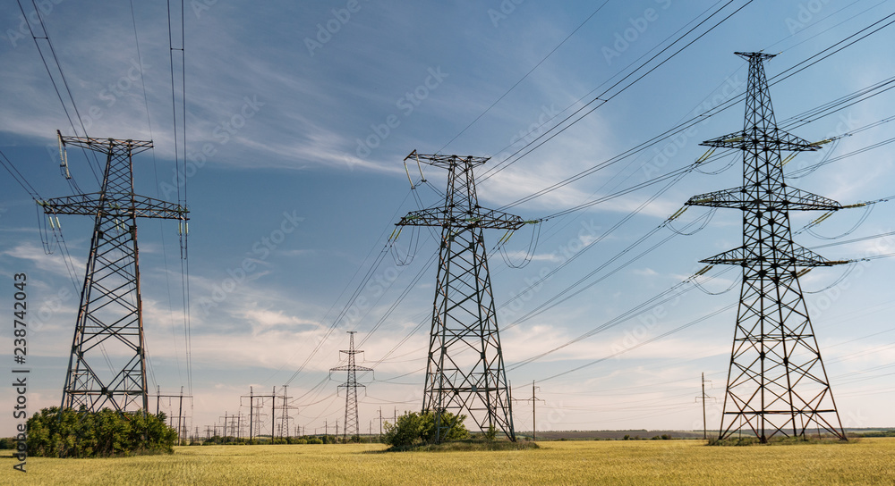 High-voltage power lines. Electricity distribution station. high voltage electric transmission tower. Distribution electric substation with power lines and transformers