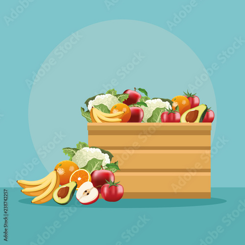 Fruits and vegetables in wooden box