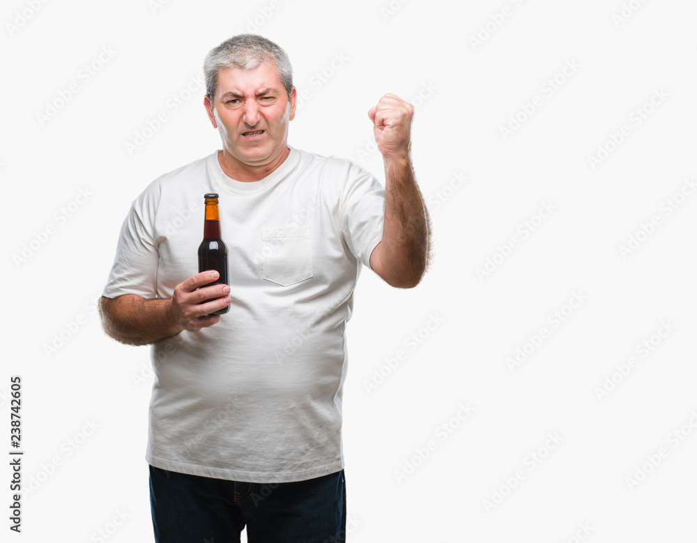 Handsome senior man drinking beer bottle over isolated background annoyed and frustrated shouting with anger, crazy and yelling with raised hand, anger concept Handsome senior man drinking beer bottle over isolated background annoyed and frustrated shouting with anger, crazy and yelling with raised hand, anger concept
