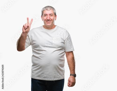 Handsome senior man over isolated background showing and pointing up with fingers number two while smiling confident and happy.