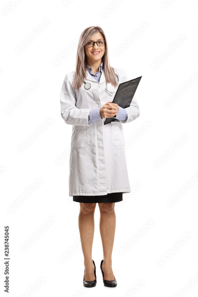 Young female doctor holding a clipboard Young female doctor holding a clipboard