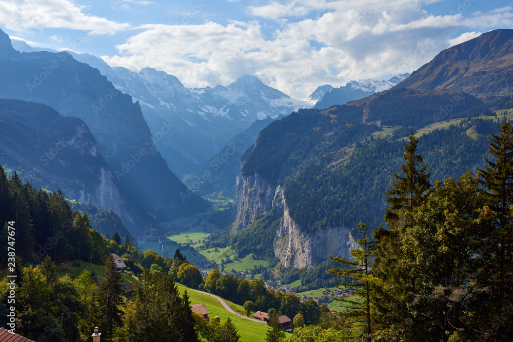 Fototapeta premium Mountain dramatic valley view from Wengen village in Lauterbrunnen in Switzerland.
