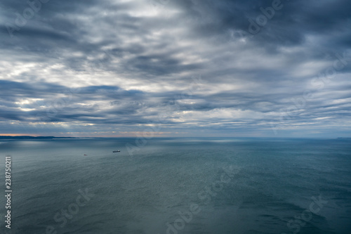 Beautiful dramatic view of cloudy sky over the sea