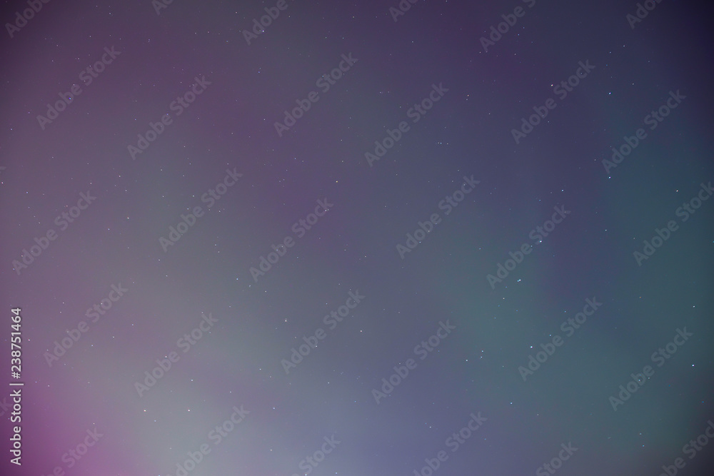 Obraz premium abstract bright background blue green purple northern lights stars&nbsp;
