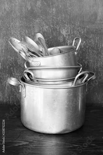 Принти на полотні Old aluminum pots and other kitchenware, black and white
