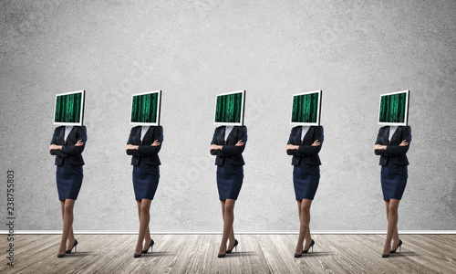 Business women with monitors instead of head.