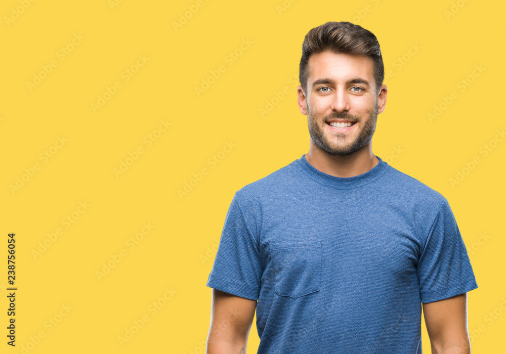 Young handsome man over isolated background with a happy and cool smile on face. Lucky person. Young handsome man over isolated background with a happy and cool smile on face. Lucky person.