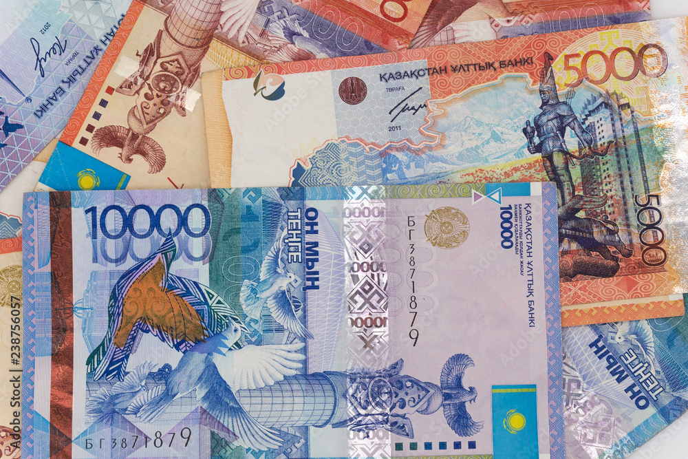 Naklejka premium Kazakhstan money bills background texture. tenge banknotes