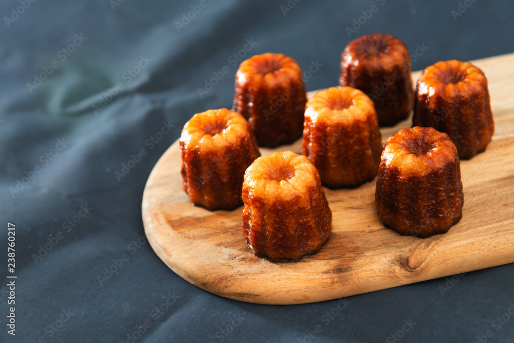Canele is a small French pastry with rum and vanilla Canele is a small French pastry with rum and vanilla