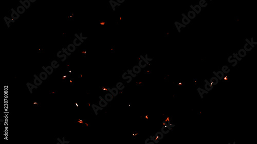 Colorful particles effect dust debris isolated on black background, motion powder spray burst in dark texture