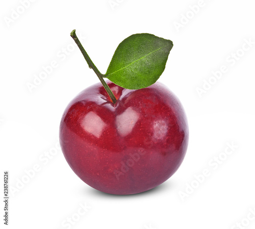 red cherry plum with green leaves isolated on white background