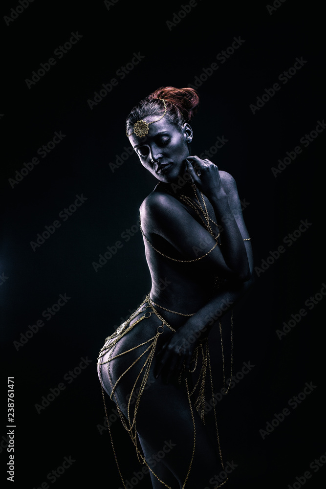 Young woman in light of ethnic ceremony Young woman in light of ethnic ceremony