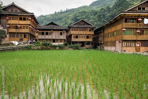 Traditional Wooden houses Village of Red Yao tribe. Longsheng Huangluo Yao Village. Guilin, Guangxi, China photo