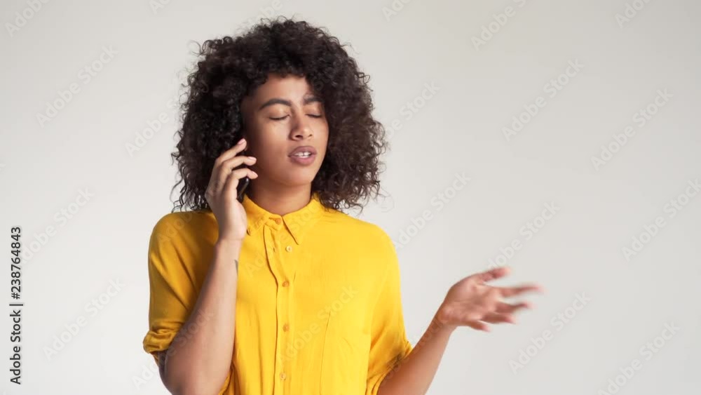 Happy woman talking on mobile phone Happy woman talking on mobile phone