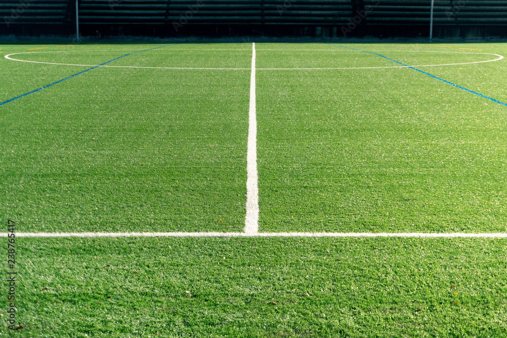 Soccer field with new artificial turf. Soccer background. Copy space
