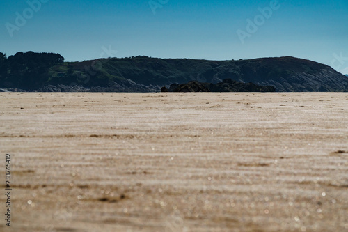 vast beach and cliffs