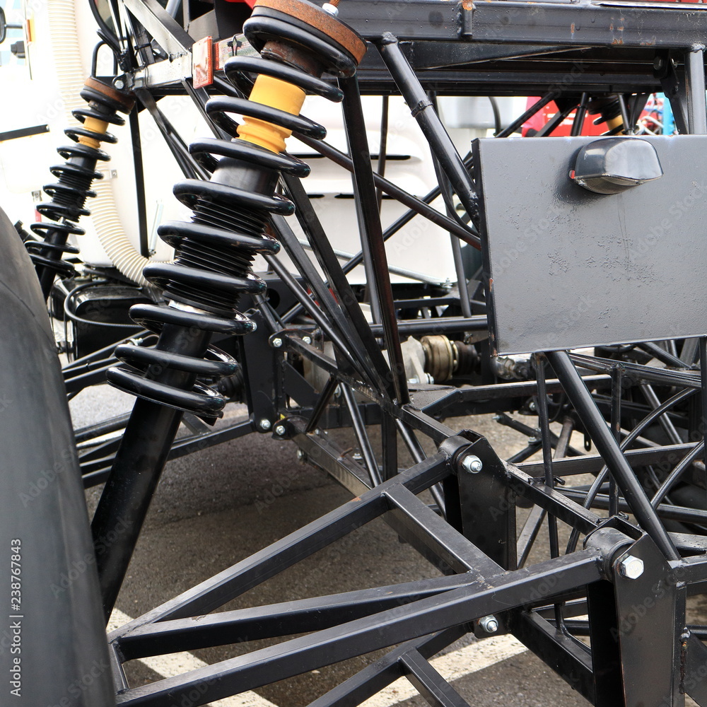 Image of agricultural machine suspension springs. Image of agricultural machine suspension springs.