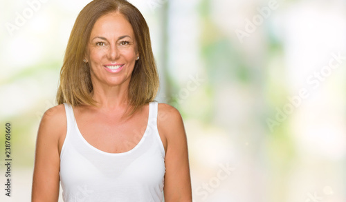 Free Download Beautiful middle age casual adult woman over isolated background with a happy and cool smile on face. Lucky person. - GFXLoad