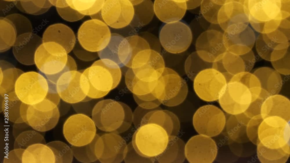 colorful running bokeh lights in the new year night illumination. colorful running bokeh lights in the new year night illumination.
