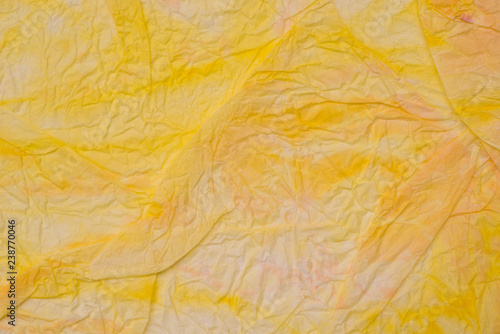 yellow creased paper tissue texture background