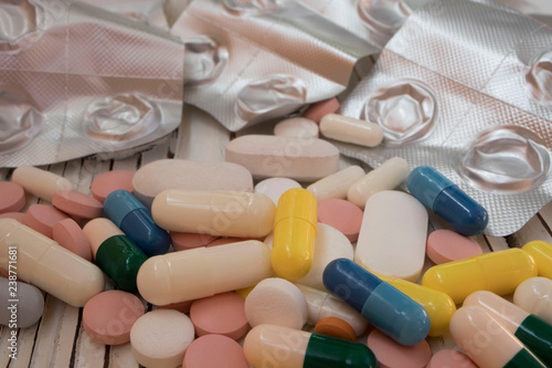 Drug addiction and chemsex illustration with syringe and pills