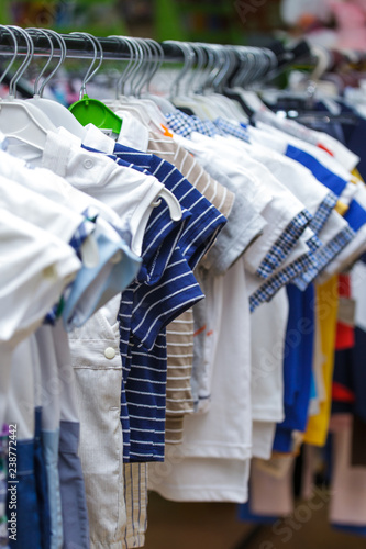 sale wear supermarket regiment hanger clothing children shirt © NataliAlba