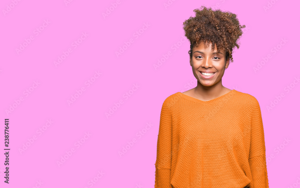 Beautiful young african american woman over isolated background with a happy and cool smile on face. Lucky person. Beautiful young african american woman over isolated background with a happy and cool smile on face. Lucky person.