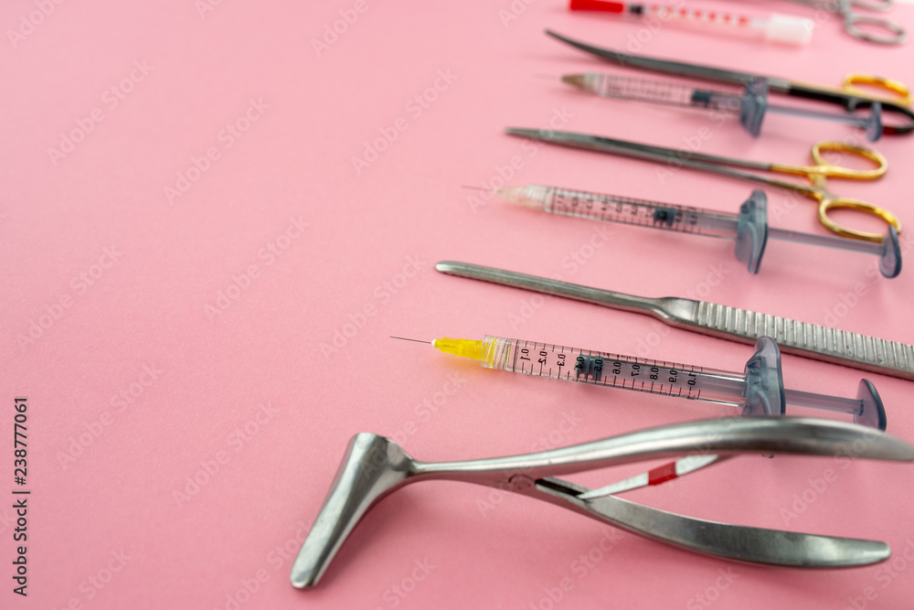 Flat lay of medical instruments on rose background. Mock up health care medical background. Flat lay of medical instruments on rose background. Mock up health care medical background.