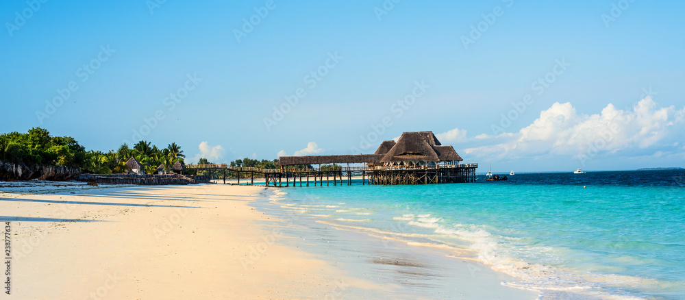 scenic view of beautiful beach and blue sky - obrazy, fototapety, plakaty 