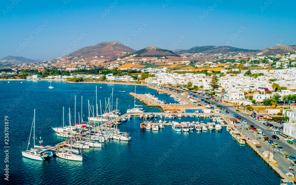 Aerial bird eye view of sailboats moored in the marina of Paros Island, Greece