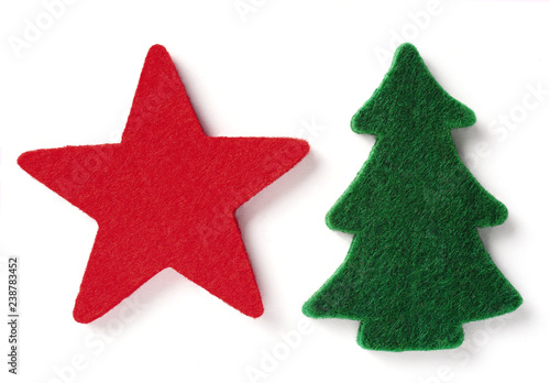 red felt star and green felt fir tree isolated over white background