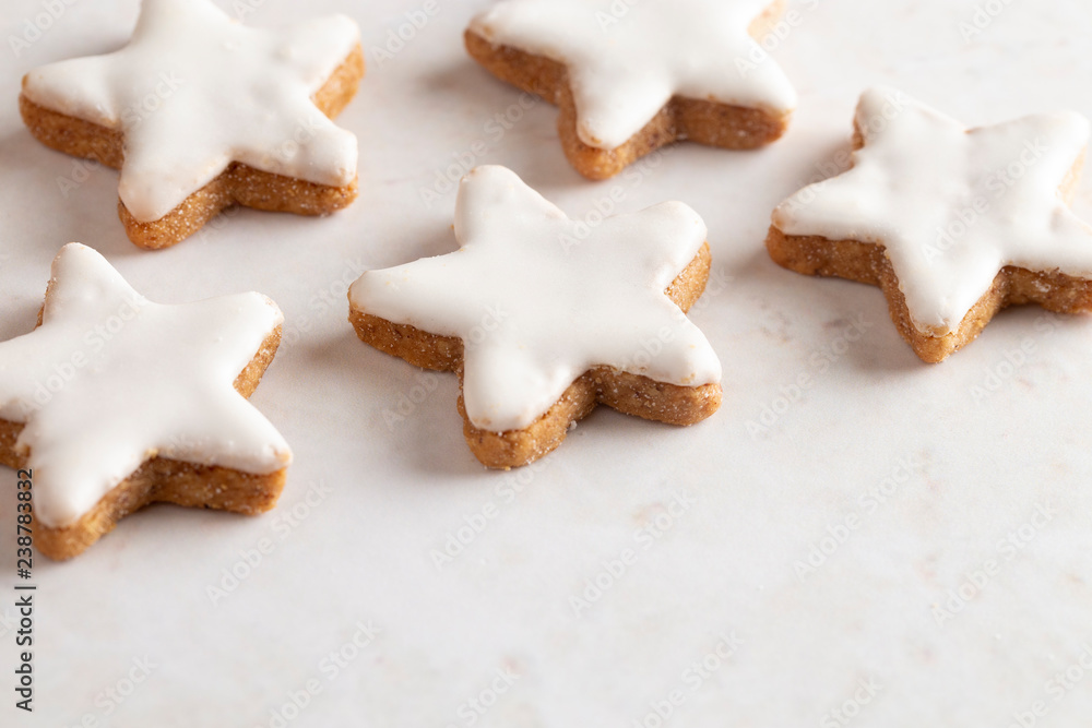 Batch of Star Shaped Gingerbread Cookies with White Icing