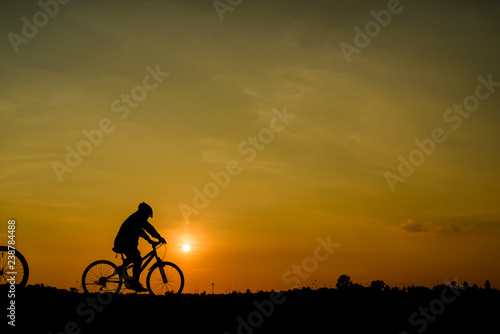 Wallpaper Mural silhouette of cyclist at sunset Torontodigital.ca