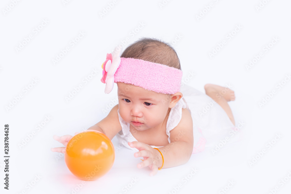 Baby girl playing ball color on a white background. Baby girl playing ball color on a white background.