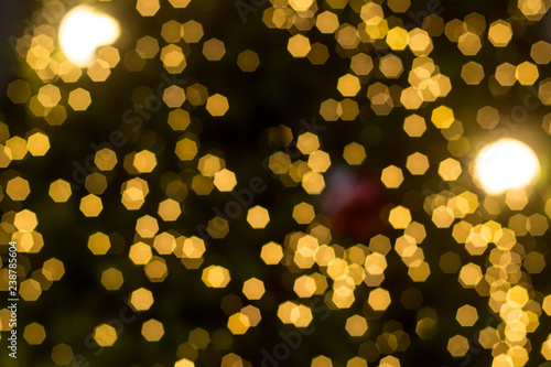 Golden bokeh background with glitter lights for Christmas and New year