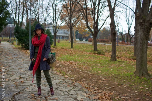 beauty fashion woman in city park