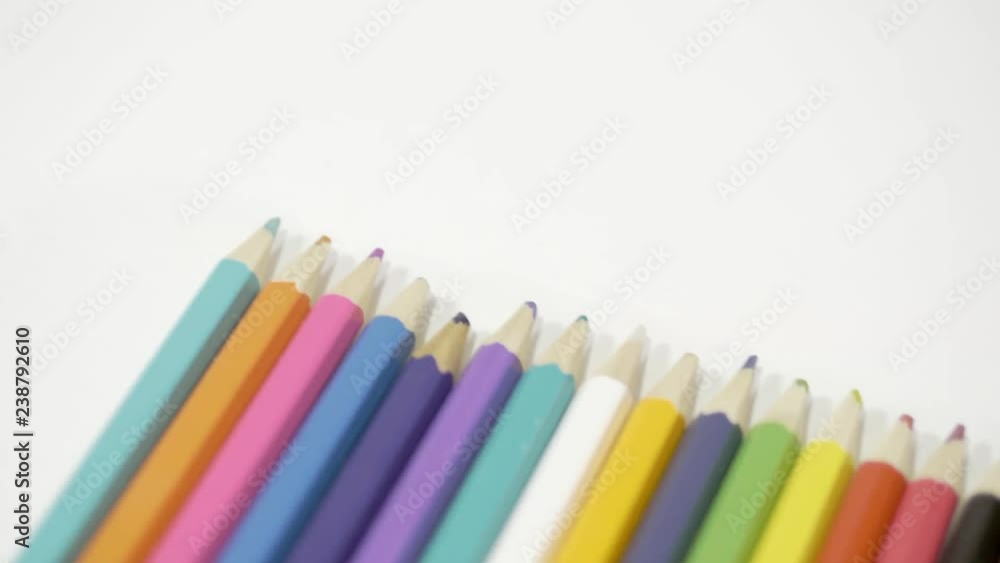 Pencil on a white background. Camera in motion. Pencils are in the glass. Pencils lie on the table in even rows. 4K Pencil on a white background. Camera in motion. Pencils are in the glass. Pencils lie on the table in even rows. 4K