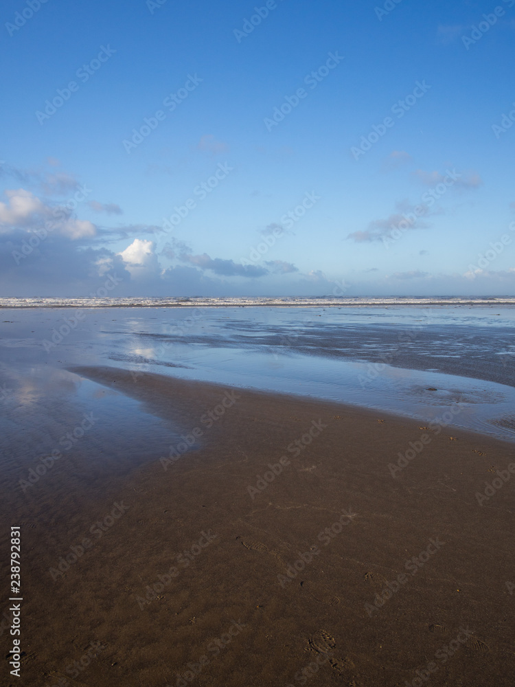 Devon beach scene background with blue sky Devon beach scene background with blue sky