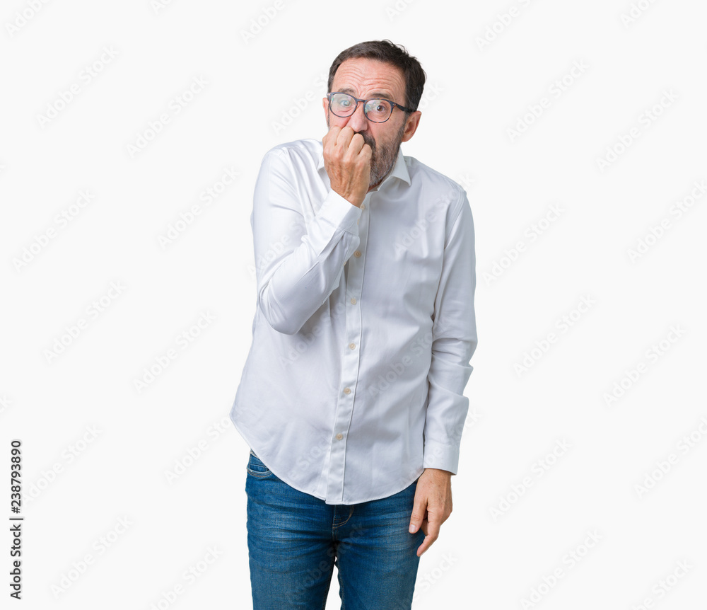 Handsome middle age elegant senior business man wearing glasses over isolated background looking stressed and nervous with hands on mouth biting nails. Anxiety problem. Handsome middle age elegant senior business man wearing glasses over isolated background looking stressed and nervous with hands on mouth biting nails. Anxiety problem.