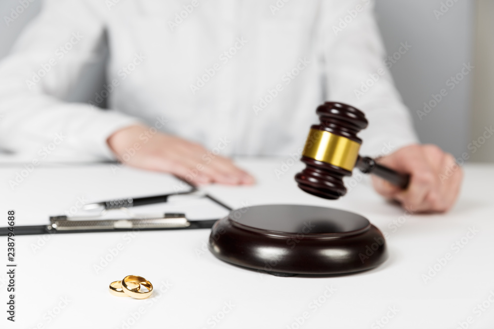 Judge gavel deciding on marriage divorce Judge gavel deciding on marriage divorce