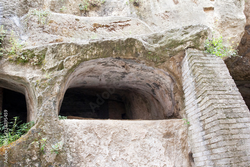 Fototapeta Naklejka Na Ścianę i Meble -  Ancient tombs dug in the tuff rock in the subsoil of Naples (Italy) called catacombs of San Gennaro.