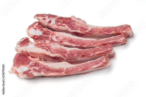 Sticky spare ribs on a white background with copy space.