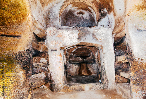 Ancient tombs dug in the tuff rock in the subsoil of Naples (Italy) called catacombs of San Gennaro. photo