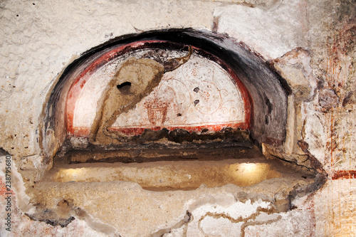 Ancient tombs dug in the tuff rock in the subsoil of Naples (Italy) called catacombs of San Gennaro. photo