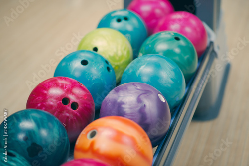 Row of bowling balls - top view