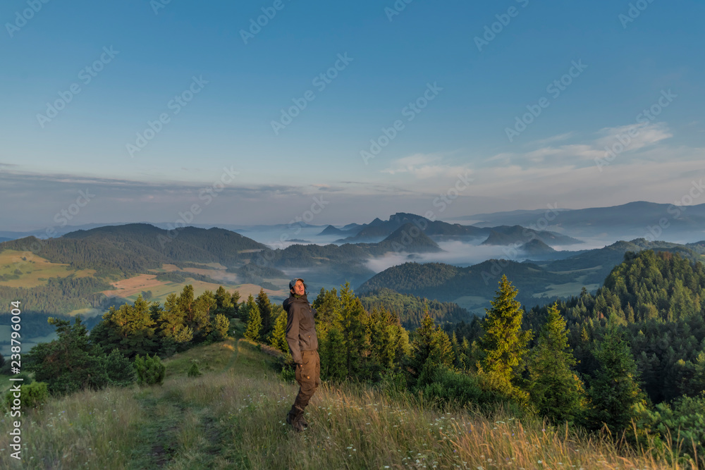 Fototapeta premium Morning in national park Pieniny with sunny shine over green meadows