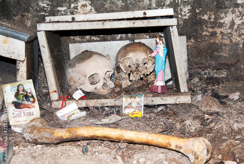 Картината върху платно The votive box for devotion toward the chosen skull inside the ancient “Fontanelle” cemetery, Naples, Italy