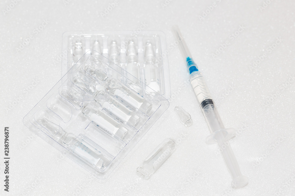syringe and ampoules with medicine syringe and ampoules with medicine