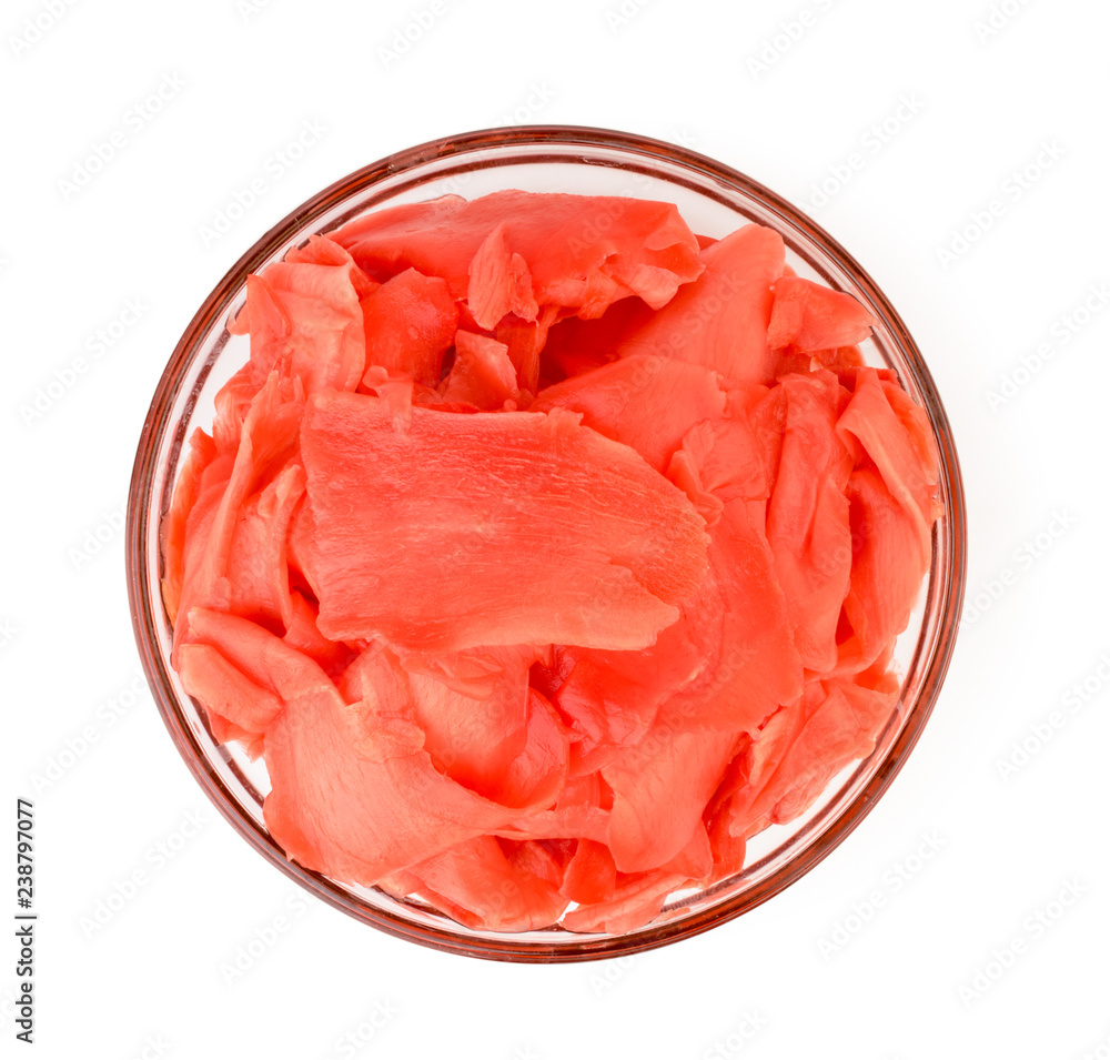 Pickled ginger leaves in a glass plate on a white. The view from the top.